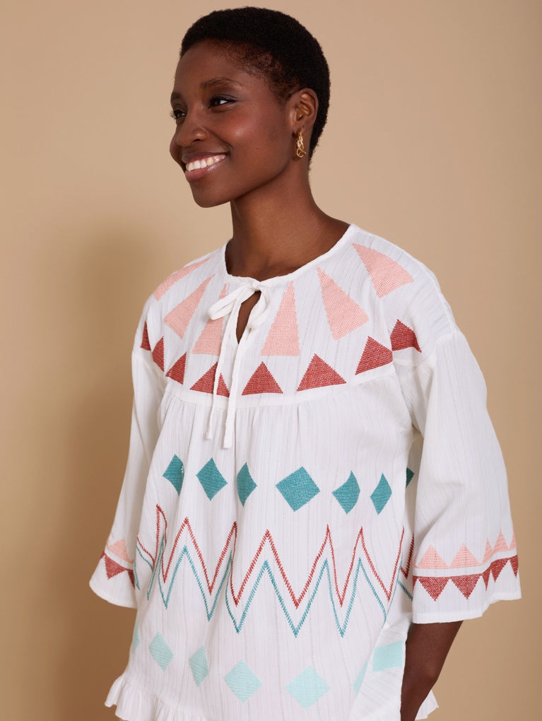 Blusa con ricami