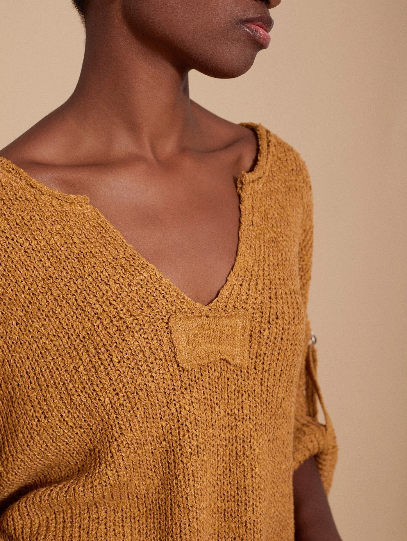 Maglia oversize con fibbia